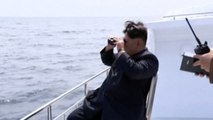 Kim Jong-un watches underwater test of ballistic missile