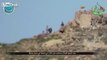Syrian insurgents with rocket hit the position of Hezbollah fighters