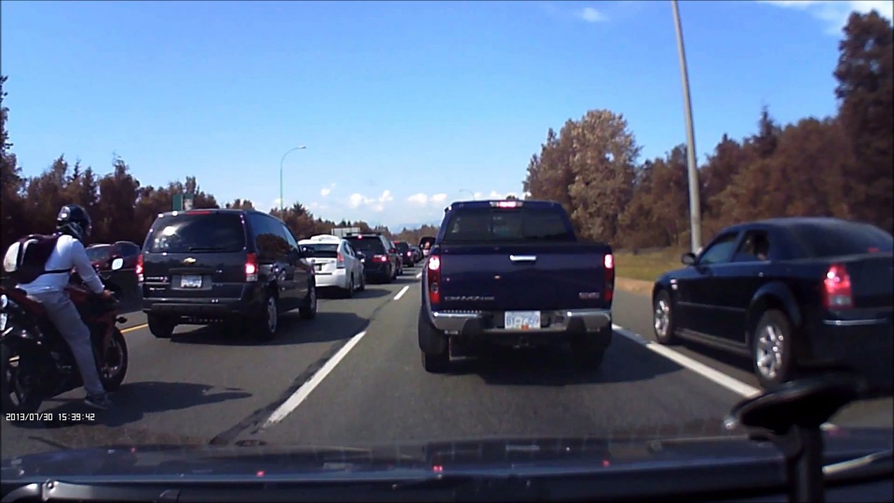 Cop pulls over TWO jackasses who think they don't have to wait in traffic