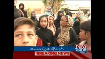 Protest outside Landhi police station against arrest of citizen