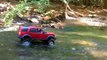 RC 1:10 Scale 4x4. Axial SCX-10 with Land Rover LR3 body. Some Rock Climbing and River Crawling.