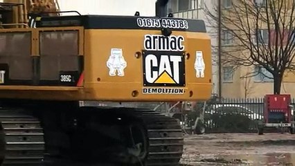 Armac Demolition demolish a factory using a Cat 385 and Cat 345 UHD excavator supplied by Finning