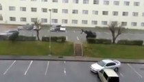 Powerful Typhoon drags and lifts a car into air in Japan