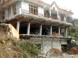 Collapsing house in Kullu by Top Singh Bodh.