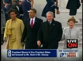 Barack Obama walks George W. Bush to 