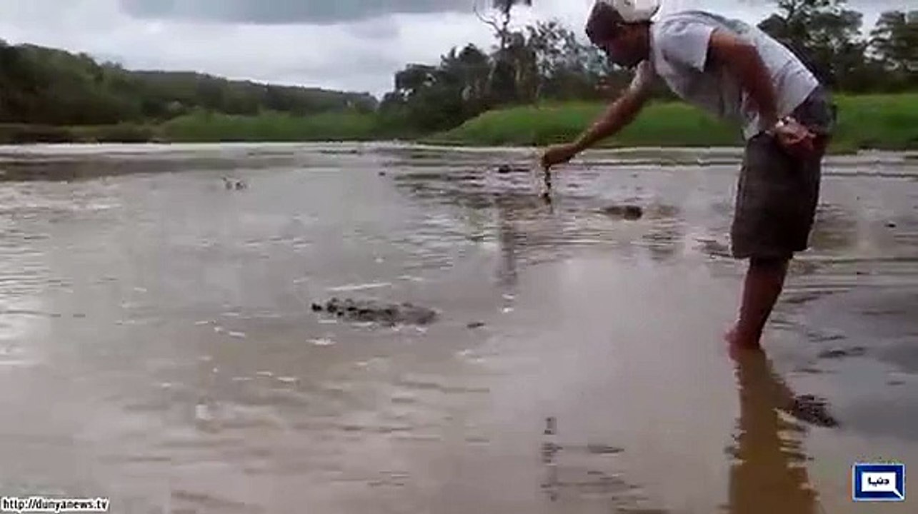 Man Almost Gets Attacked By Crocodile.