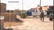 Fierce fighting rages near airbase in Iraq's Anbar