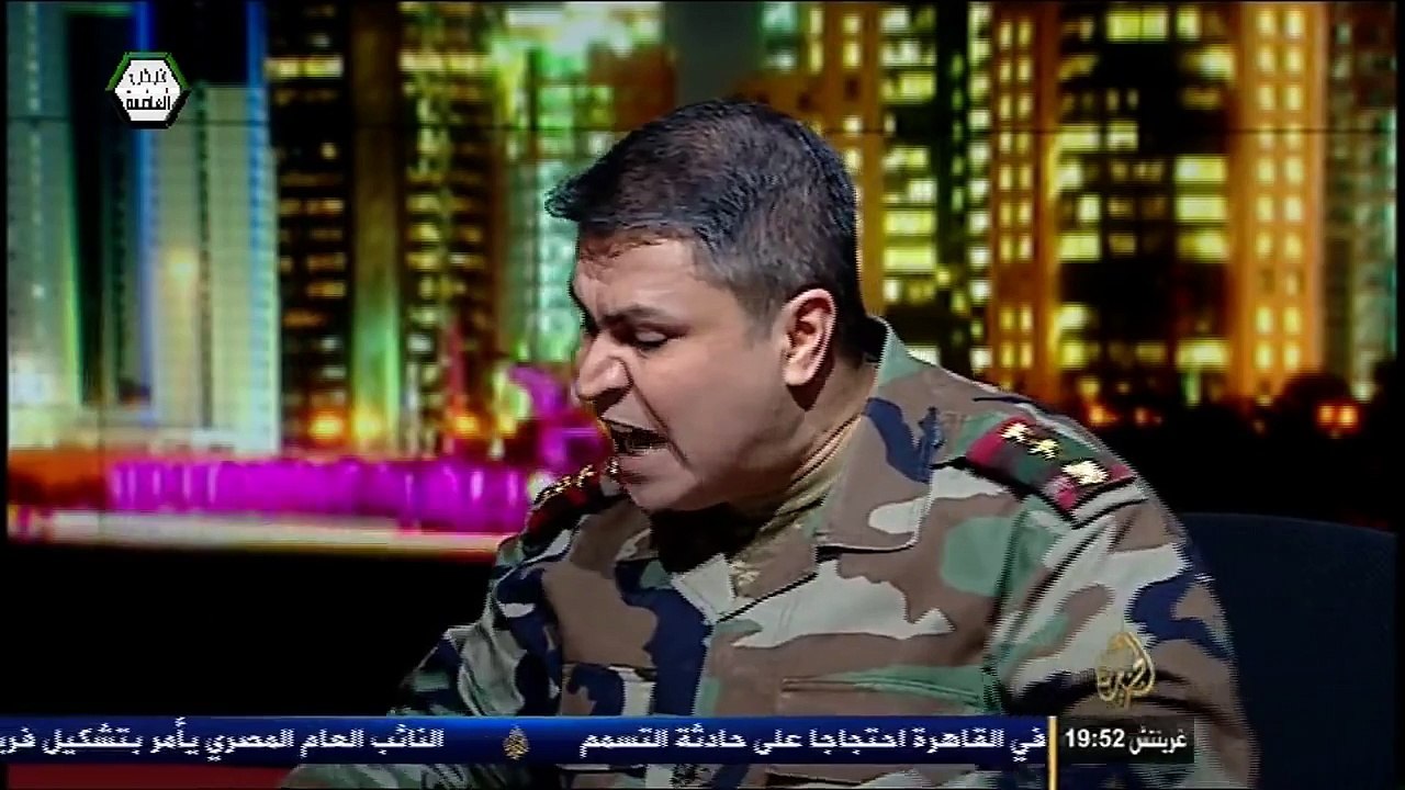 هروب الشبيح هيثم سباهي من البطل العقيد عبد الحميد زكريا في الأتجاه المعاكس 2013/4/2