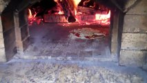 How to cook pizza in a wood fired oven