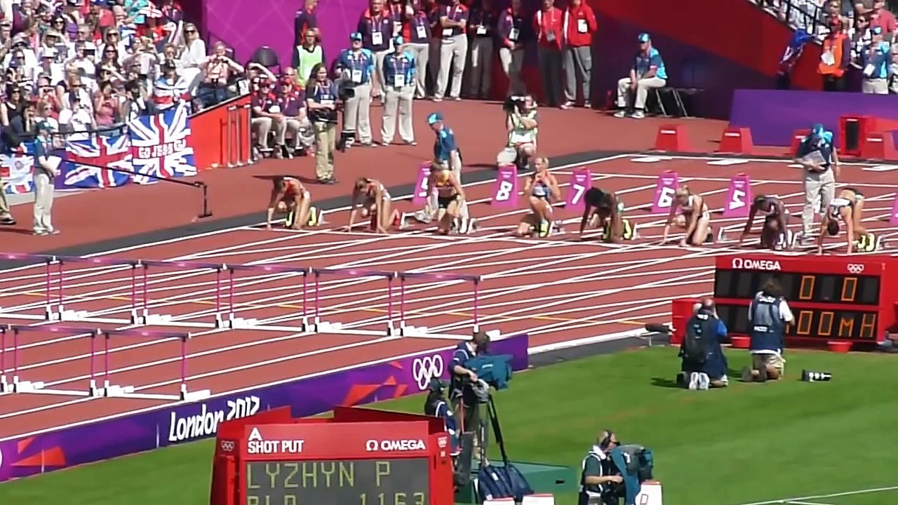 Jessica Ennis 100m hurdles with falling athlete at end