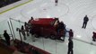 Harvard players pushing the Zamboni off the ice