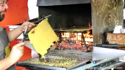 Italy Street Food. Cooking the "miassa" Corn Flatbread from Piedmont