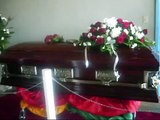 GREGORY ISAACS IN HIS CASKET AT HIS FUNERAL- IN KINGSTON,JA.