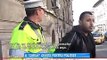 Un politist din Craiova a fost luat pe capota de un taximetrist!