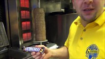 Eating a Deep-Fried Mars Bar along with a Battered Snickers and Twix bar in Edinburgh, Scotland