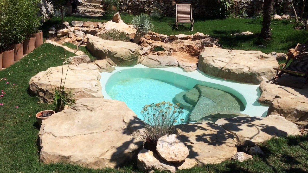Décors faux rochers piscine paysagée - Vidéo Dailymotion