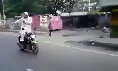 Baba Dancing while Running a Motorcycle