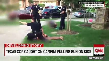 Texas cop caught on camera pulling gun on kids