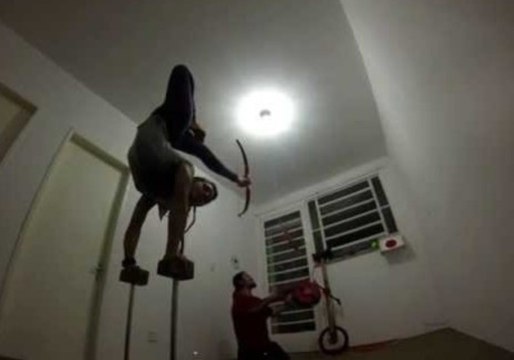 Contortionist Shoots Arrow at Moving Target With Her Foot