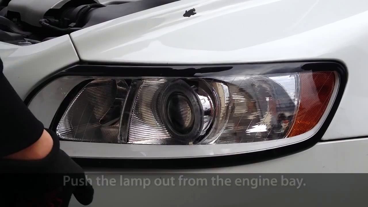How to remove headlights in Volvo C30, S40, V50, C70 (light bulb change