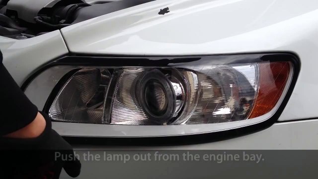 How to remove headlights in Volvo C30, S40, V50, C70 (light bulb change)