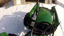 Buhler Allied Snow Blower and John Deere 5403 utility tractor plowing snow