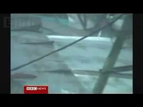 Burma (Myanmar) disaster footage & Rambo teaser cross-cut