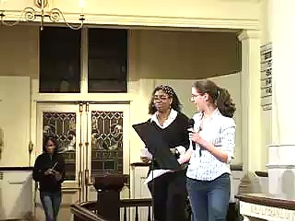 Girls Write Now mentee-mentor pair "bite" into their writing