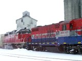 HESR 1471/3838 pulling hard on some frozen snowed in cars.