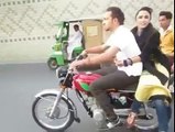 Pakistani Desi Girls and Boy One Wheeling 2015