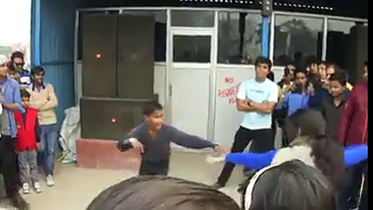 Dance compitition between girl and boy on road