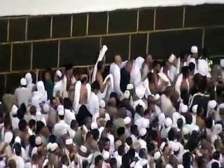 Hajj view of the Kaaba as pilgrims walk