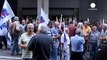 Protestas antiausteridad en Atenas mientras el Eurogrupo exige a Tsipras que baje las pensiones