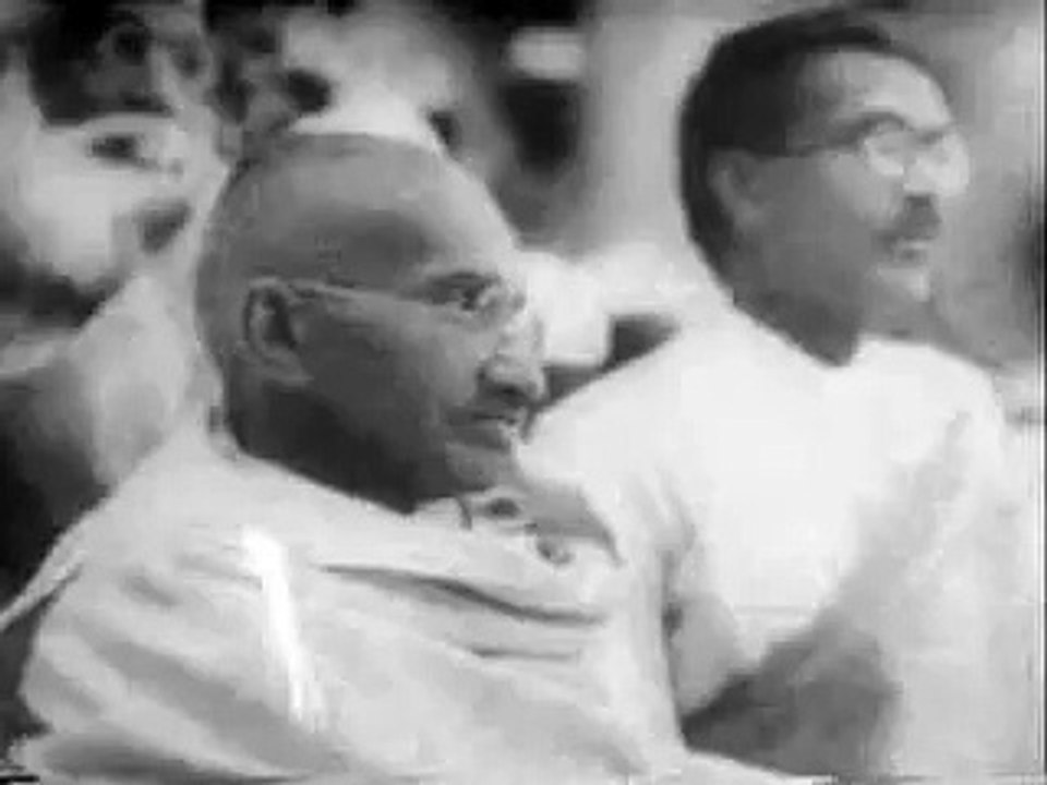 Gandhi using a Spinning Wheel in India - Gandhi video footage