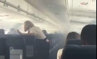 Plane makes emergency landing after cabin fills with smoke