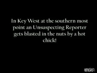 Hot Chick kicks reporter in the nuts!