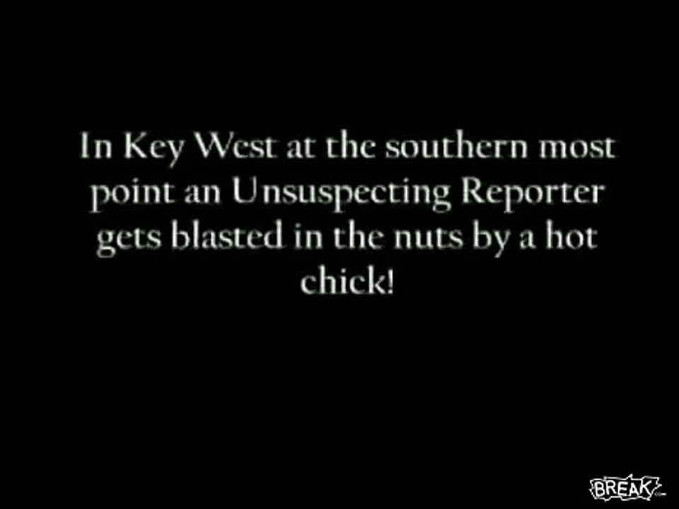 Hot Chick kicks reporter in the nuts!