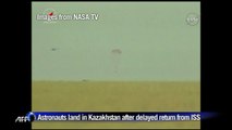 Astronauts land in Kazakhstan after delayed return from ISS