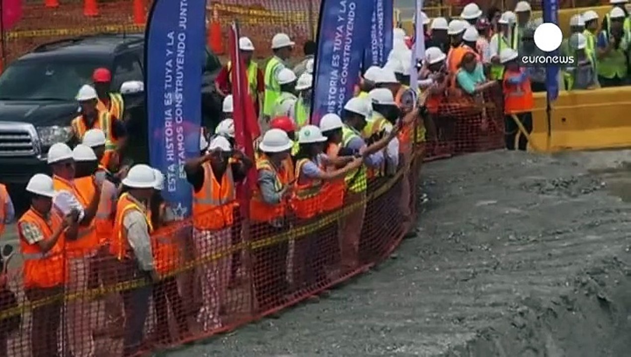 Engineers flood newly-expanded Panama Canal section