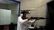 Arab shooting a gun