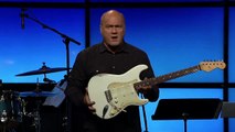 Pastor Greg demonstrates that the value in a guitar is based on WHO plays it