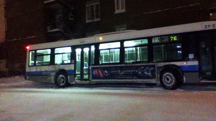 STM Montreal NovaBus LFS stuck in a snow bank at Du-College Métro.