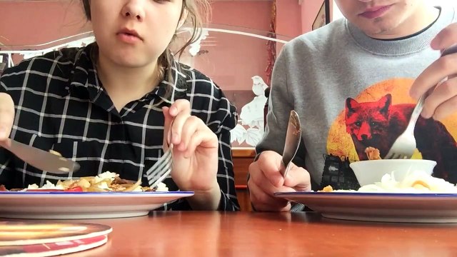 weird couple eating chinese food BACKWARDS