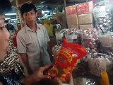Bartering/Negotiating at An Dong shopping center, Chinatown, Ho Chi Minh City, Vietnam