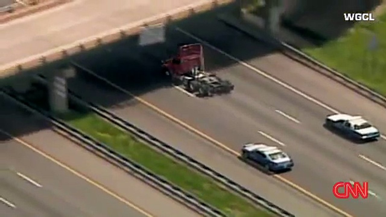 Police Chase as Man Hangs On His Stolen Truck