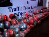 This fighting scene is from free distribution of helmets in karachi