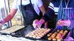 London Street Food. Japanese Takoyaki Snack. Cooked in Brick Lane