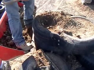 Earthship Construction, Packing a tire