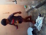 A small kid is washing the cloths(funny video)