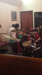 Talented baby drummer keeps a steady beat!